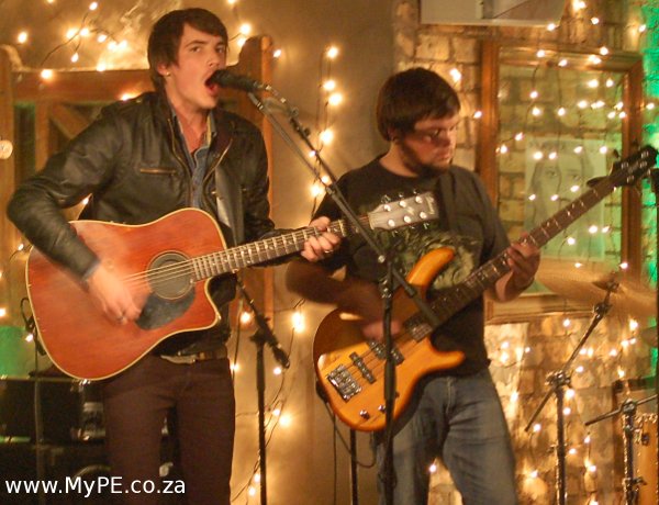 Stuart Reece on accoustic guitar and Barry Killian on bass guitar