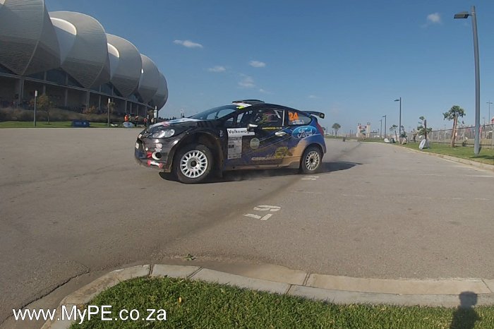 The 2014 VWSA Rally winning pair of Mark Cronje and Robin Houghton complete the final special stage around the Nelson Mandela Bay Stadium.