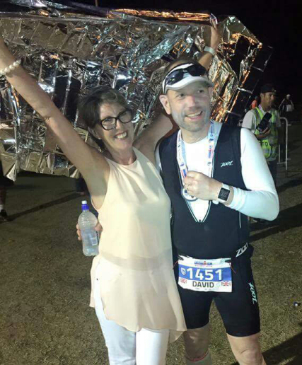 Ironman David and Ironfan Val reuinted at the finish