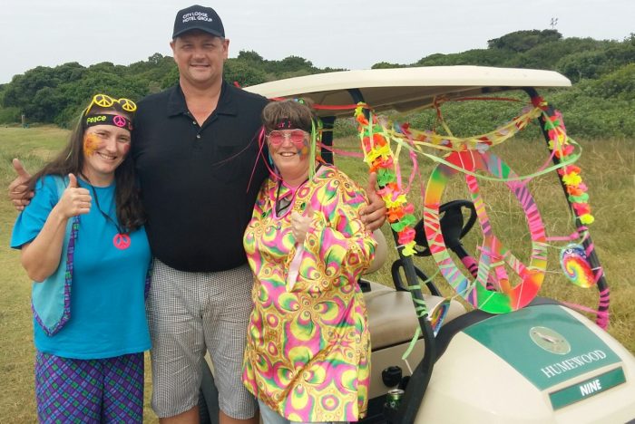 (left to right) riding the “peace” golf cart Courtyard Hotel PE assistant general manager, Shanna Oosthuizen; Courtyard Hotel PE general manager, Eddie van Zyl (who organised the annual charity event); and Courtyard Hotel PE assistant housekeeper, Madelein Fourie.