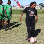 Banyana Banyana Player Desiree Ellis and learners from Vuyani Primary